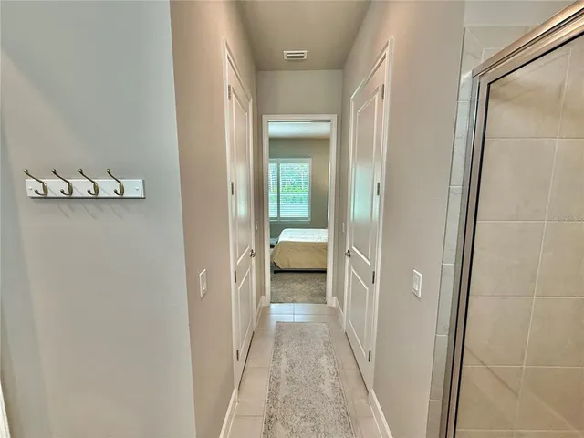 a bedroom with a bed and a cabinets