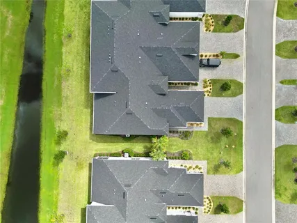 an aerial view of residential house with outdoor space