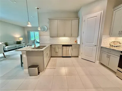 a view of a bathroom with a glass door shower