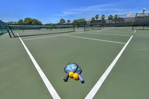 a living room with lots of furniture and a large window