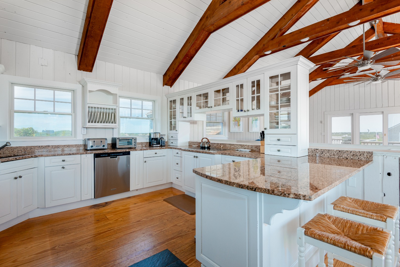 1 Reeds Way Nantucket, MA 02554 - Photo 33 of 51 a kitchen with stainless steel appliances granite countertop a stove and a sink