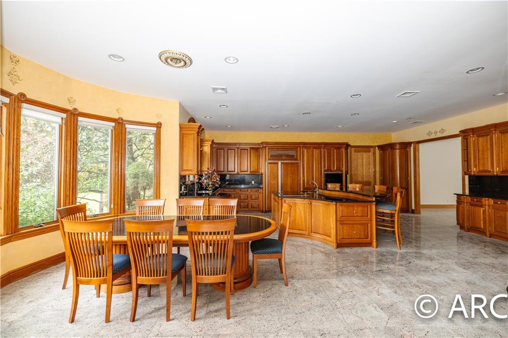 66 Wolver Hollow Road Glen Head, NY 11545 - Photo 12 of 46 a dining room with furniture window and outside view