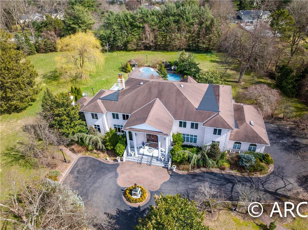 66 Wolver Hollow Road Glen Head, NY 11545 - Photo 2 of 46 an aerial view of a house