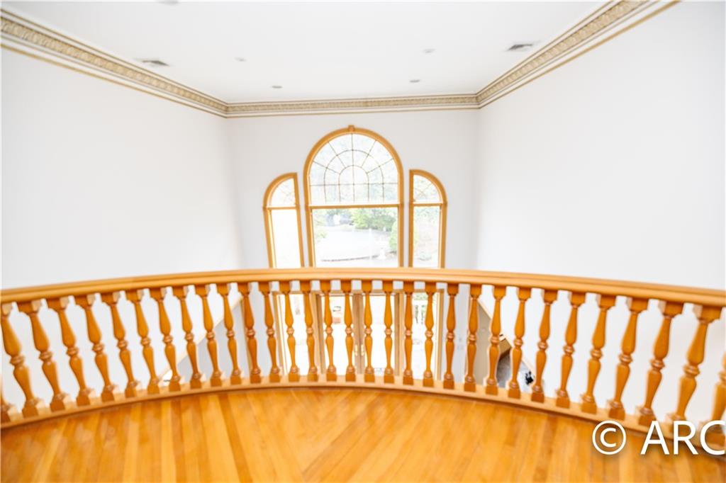 66 Wolver Hollow Road Glen Head, NY 11545 - Photo 21 of 46 a view of a large window with wooden floor