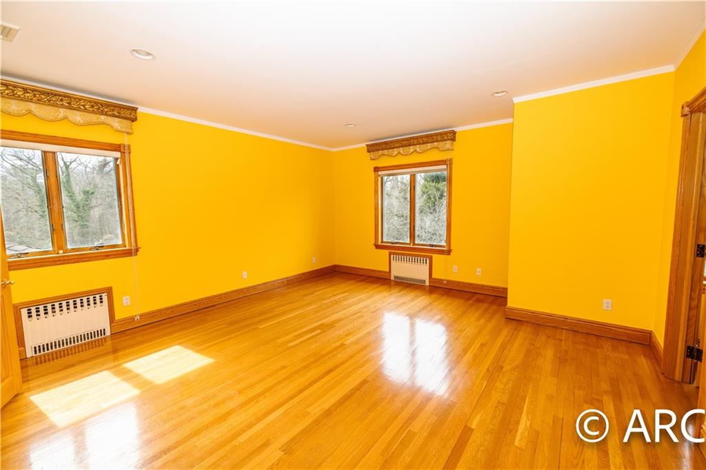 66 Wolver Hollow Road Glen Head, NY 11545 - Photo 28 of 46 a view of an empty room and window