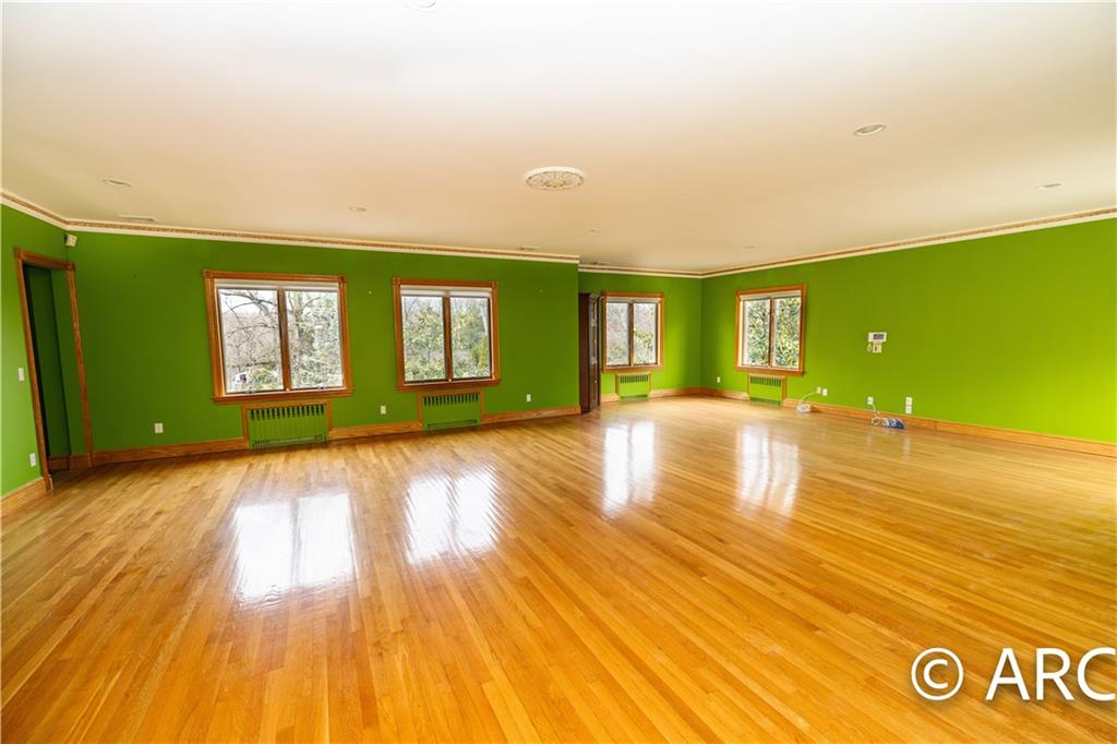 66 Wolver Hollow Road Glen Head, NY 11545 - Photo 32 of 46 a view of an empty room with window