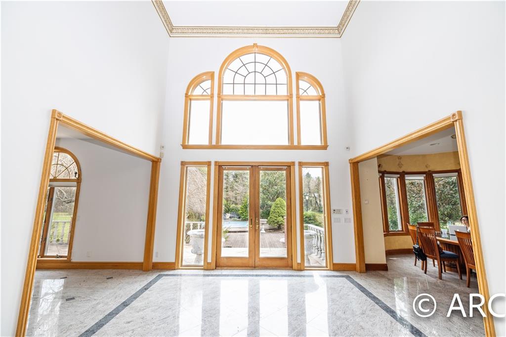 66 Wolver Hollow Road Glen Head, NY 11545 - Photo 10 of 46 a view of an entryway with a livingroom