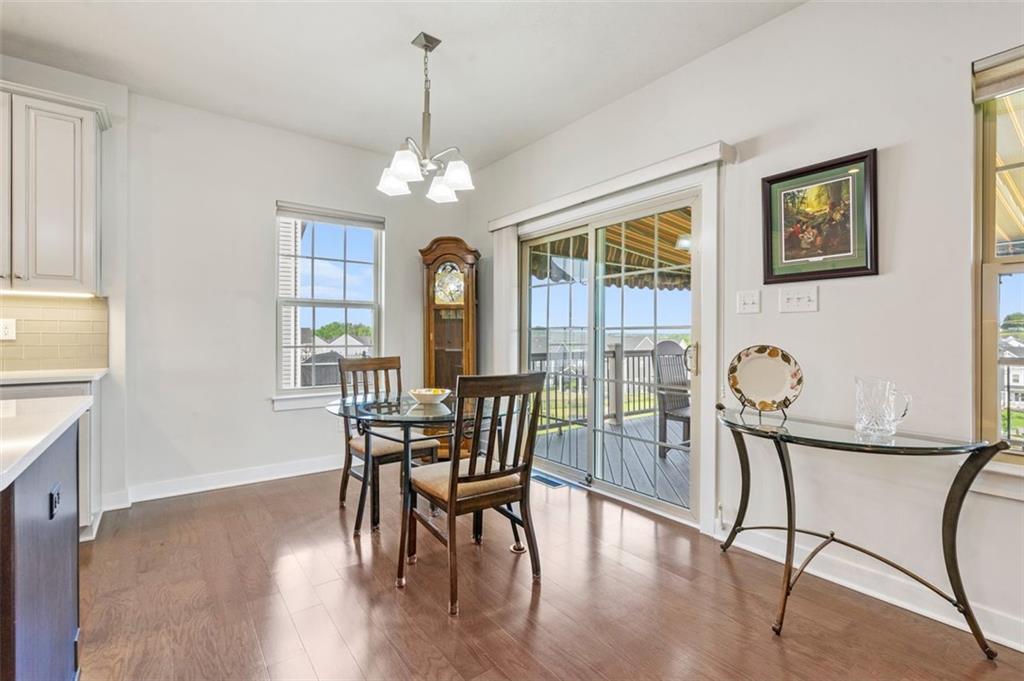 235 Regency Drive Eighty Four, PA 15330 - Photo 16 of 37 a view of a dining room with furniture window and wooden floor