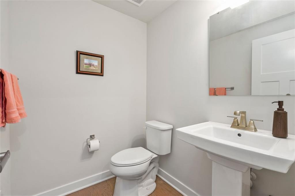 235 Regency Drive Eighty Four, PA 15330 - Photo 24 of 37 a bathroom with a sink mirror and toilet