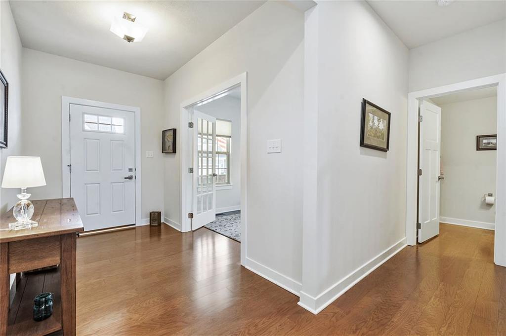 235 Regency Drive Eighty Four, PA 15330 - Photo 3 of 37 a view of livingroom with hardwood floor and a ceiling fan