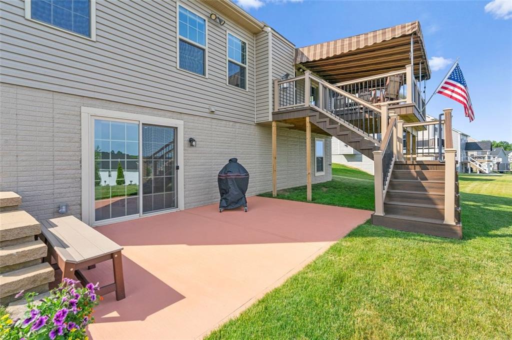 235 Regency Drive Eighty Four, PA 15330 - Photo 35 of 37 a patio with a table and chairs and potted plants