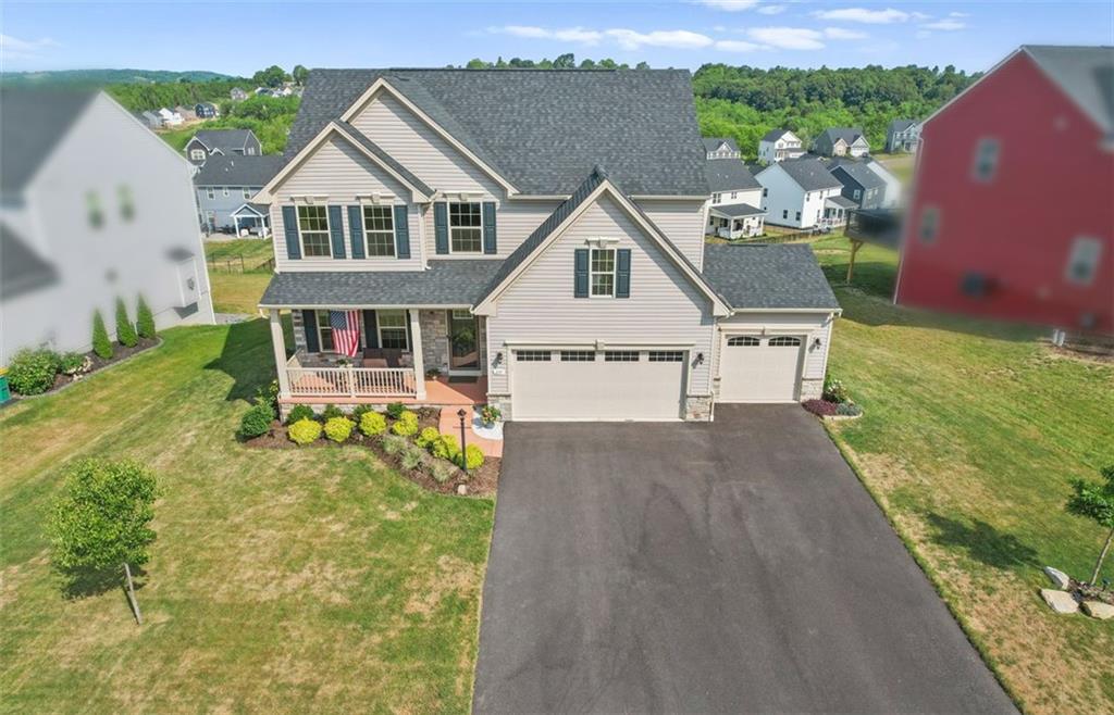 235 Regency Drive Eighty Four, PA 15330 - Photo 37 of 37 a front view of a house with a yard