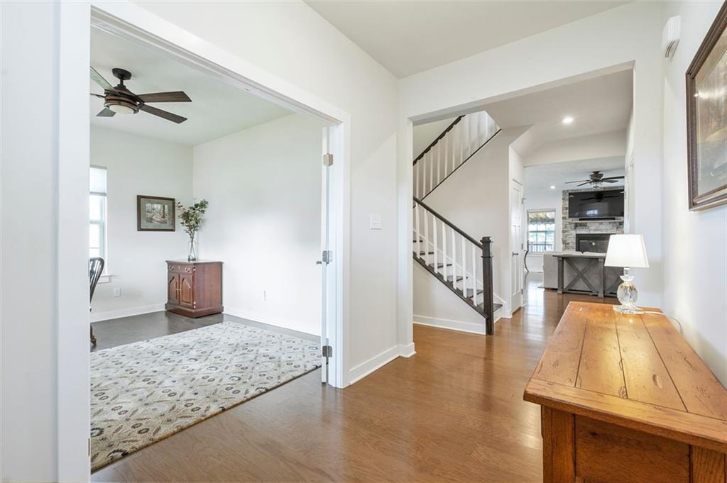 235 Regency Drive Eighty Four, PA 15330 - Photo 4 of 37 a view of a hallway view with staircase and kitchen view