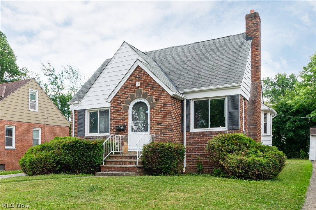 4122 Lambert Road Cleveland, OH 44121 - Photo 2 of 32 View of front of home with a front lawn