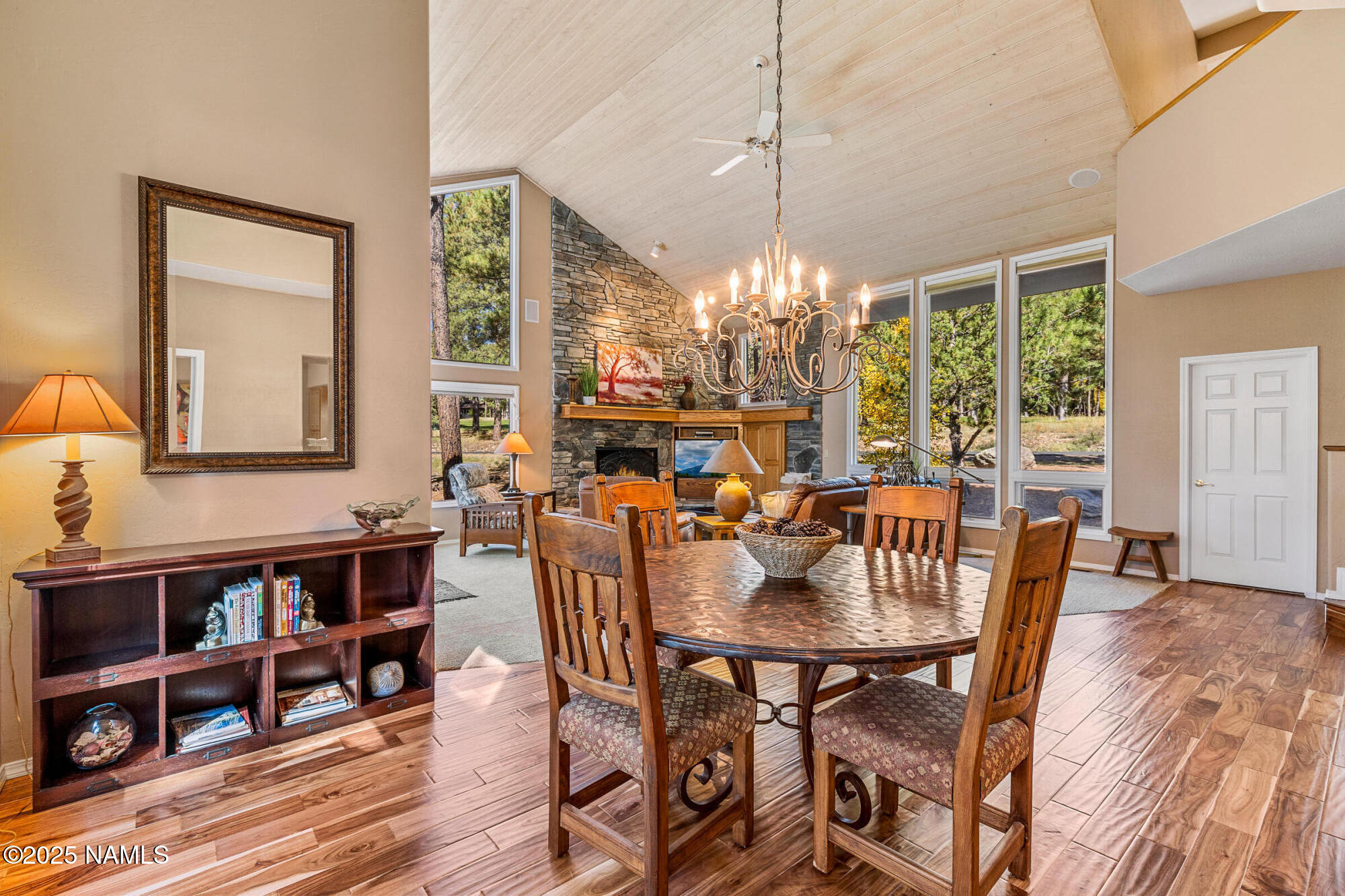 2252 Link Smith Flagstaff, AZ 86005 - Photo 13 of 53 a view of a dining room with furniture window and wooden floor