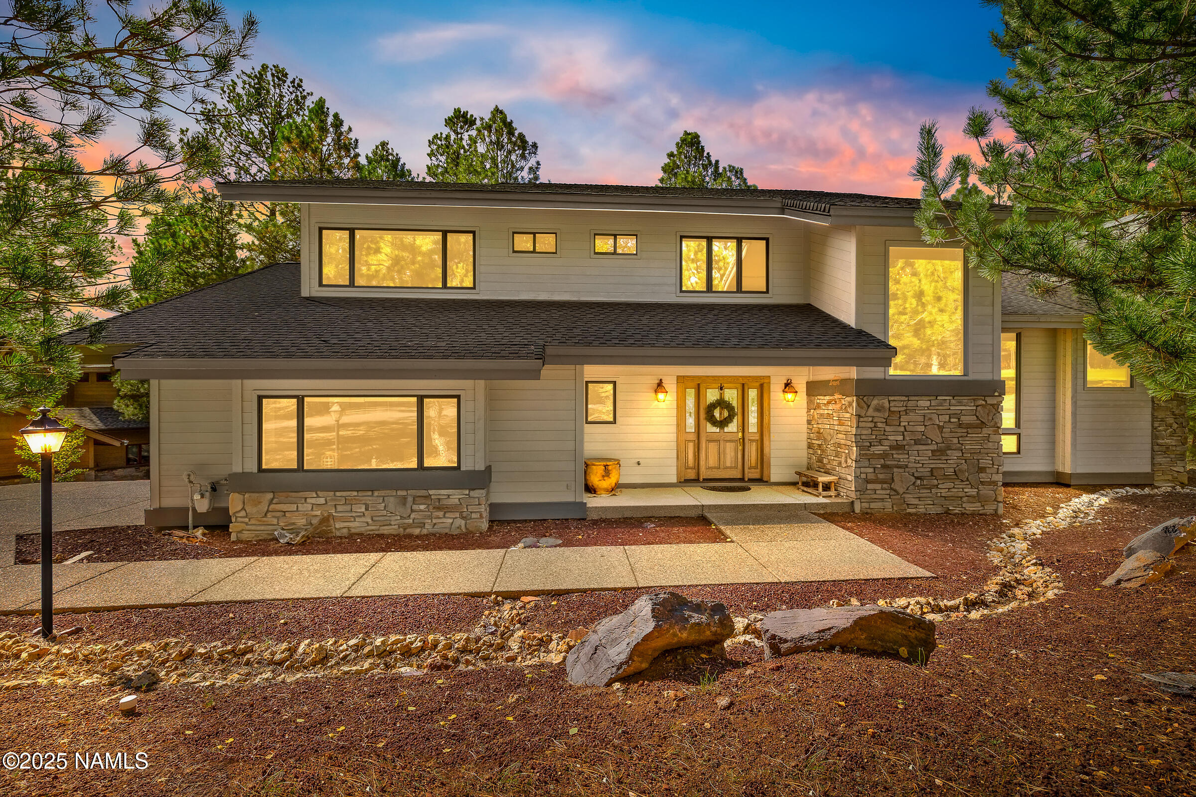2252 Link Smith Flagstaff, AZ 86005 - Photo 2 of 53 a front view of a house with a yard