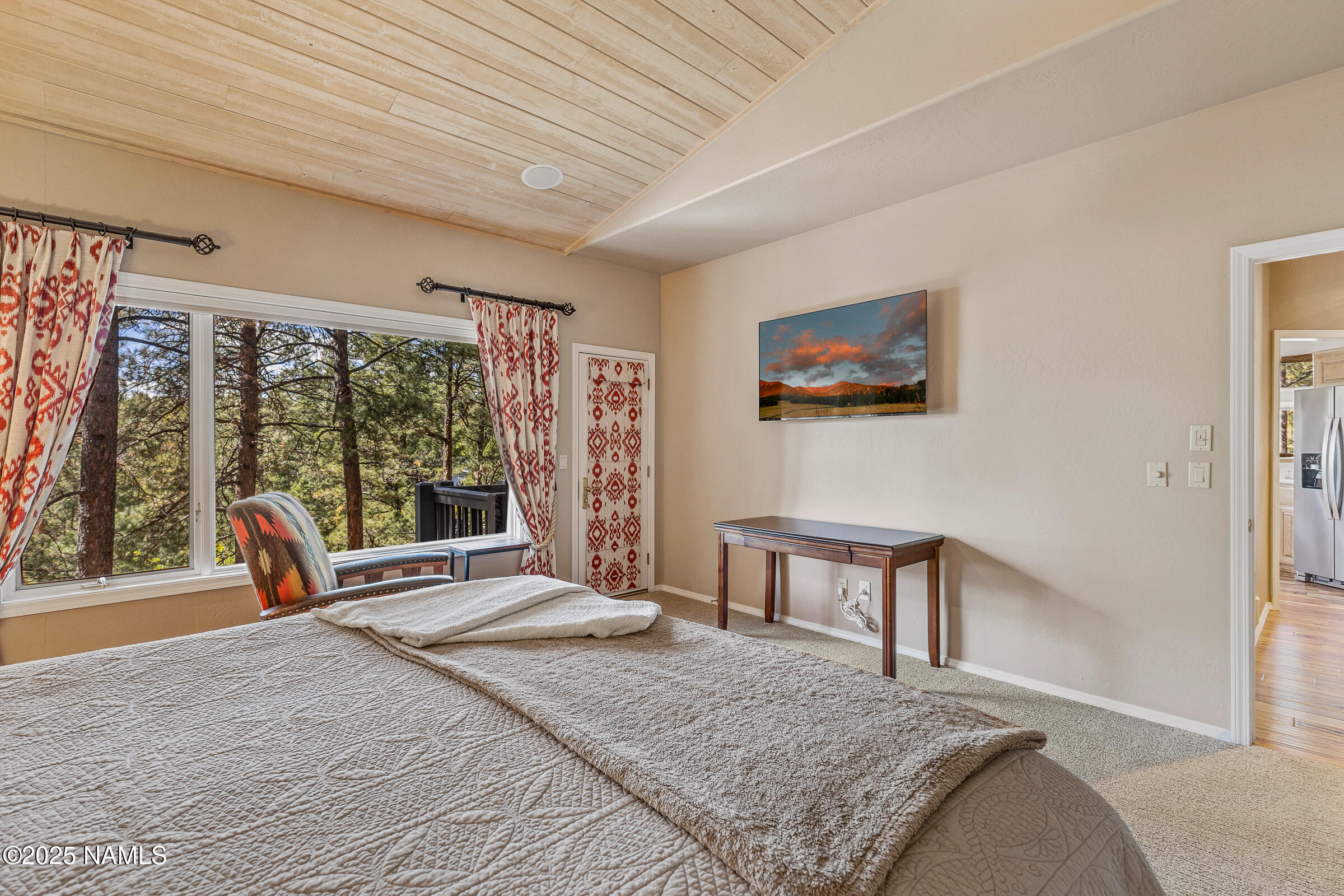 2252 Link Smith Flagstaff, AZ 86005 - Photo 22 of 53 a bedroom with a bed and a large window