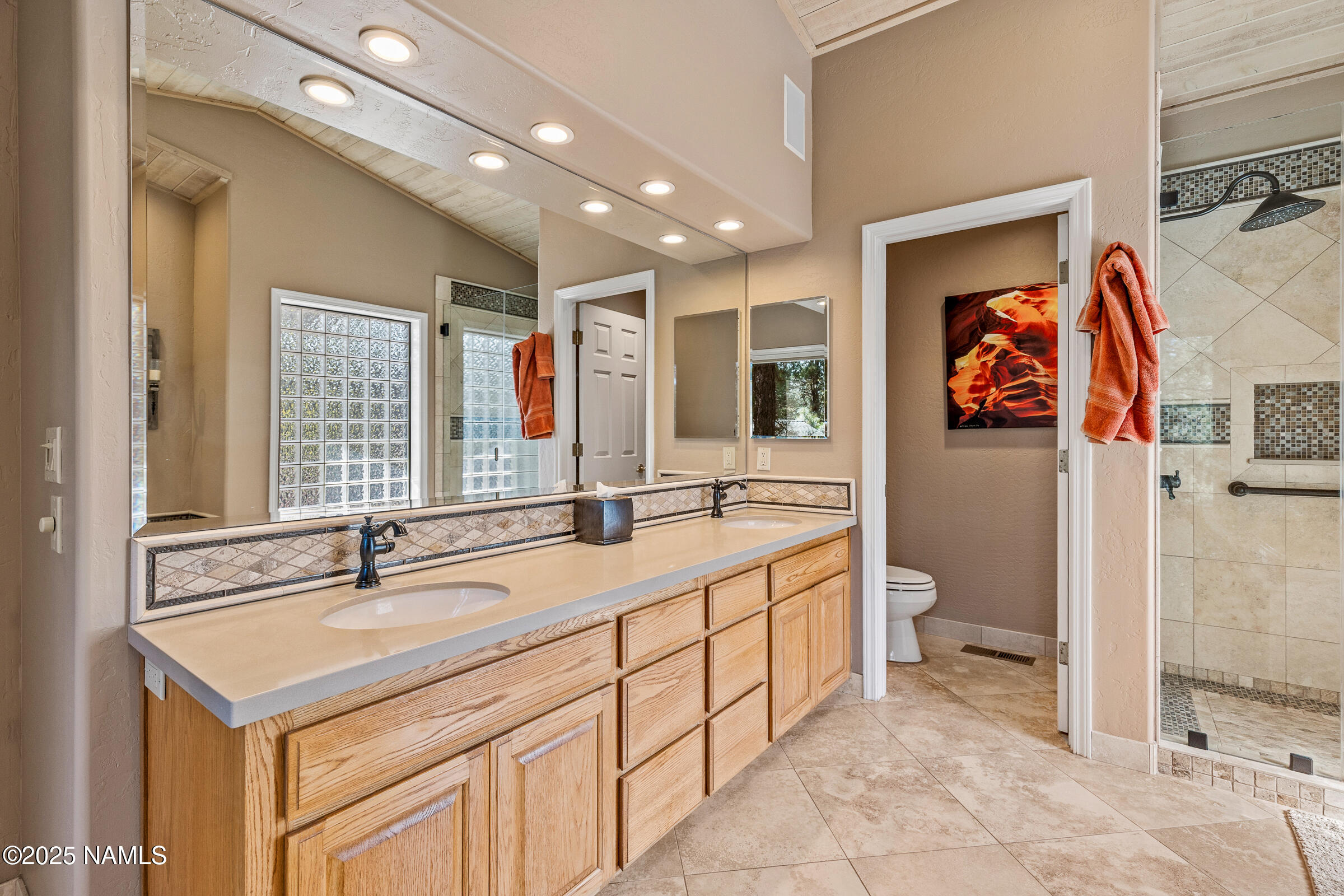 2252 Link Smith Flagstaff, AZ 86005 - Photo 23 of 53 a spacious bathroom with a double vanity sink mirror and