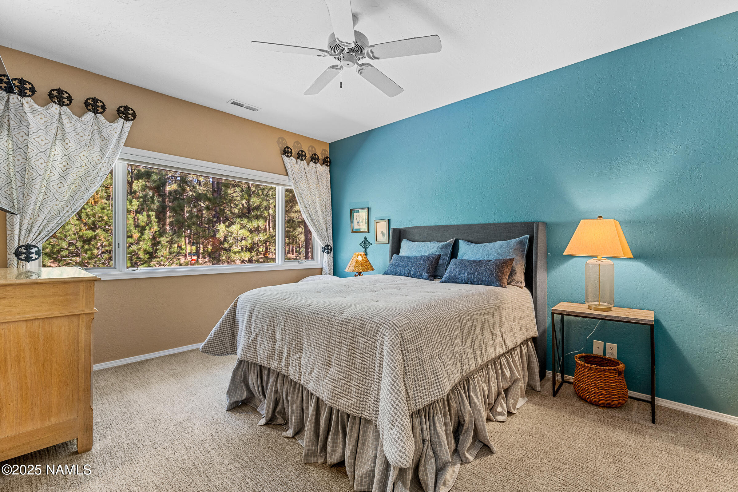 2252 Link Smith Flagstaff, AZ 86005 - Photo 32 of 53 a bedroom with a bed and a window