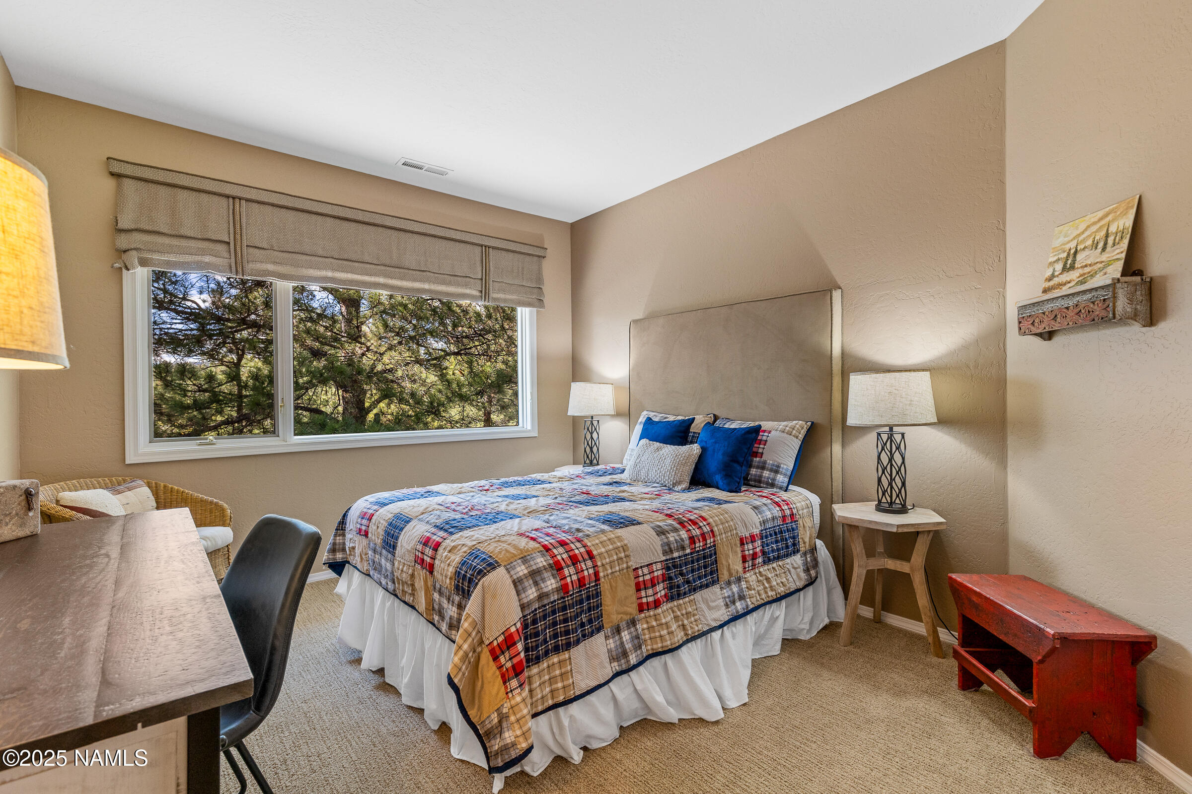 2252 Link Smith Flagstaff, AZ 86005 - Photo 39 of 53 a bedroom with a bed and window
