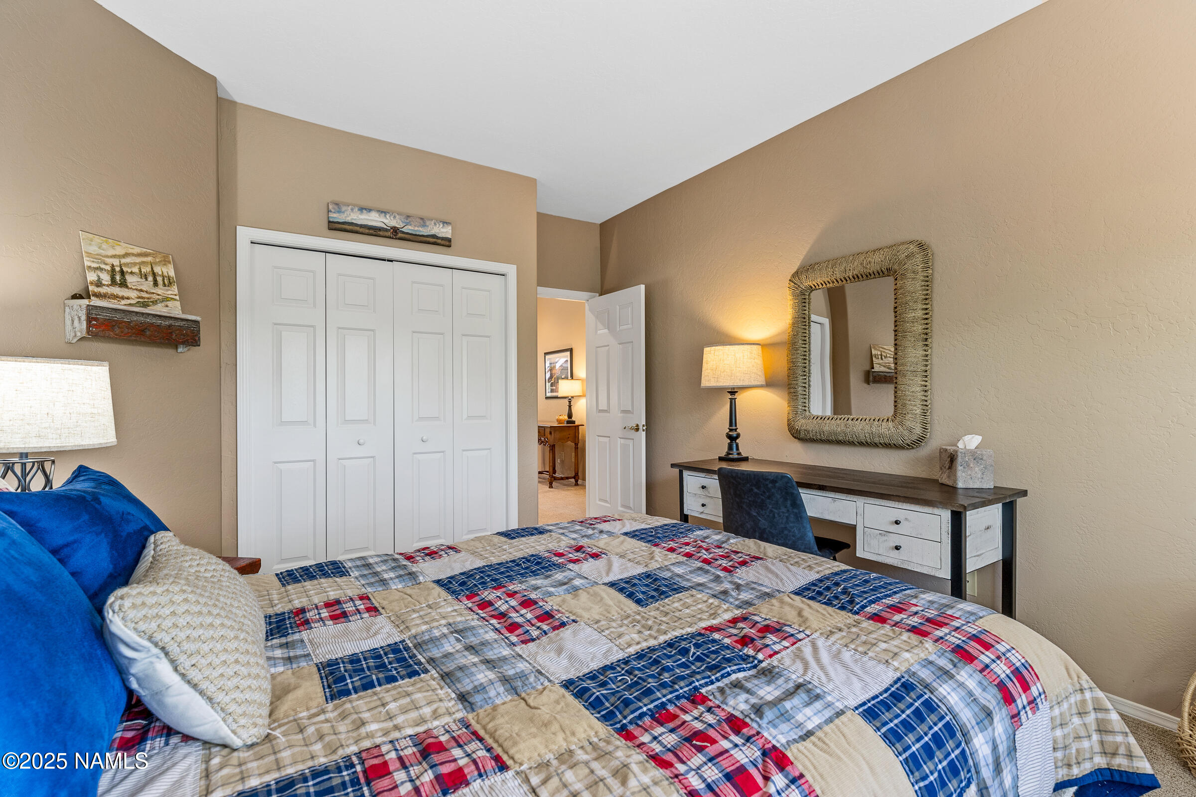 2252 Link Smith Flagstaff, AZ 86005 - Photo 40 of 53 a bedroom with a bed a dresser and next to a window