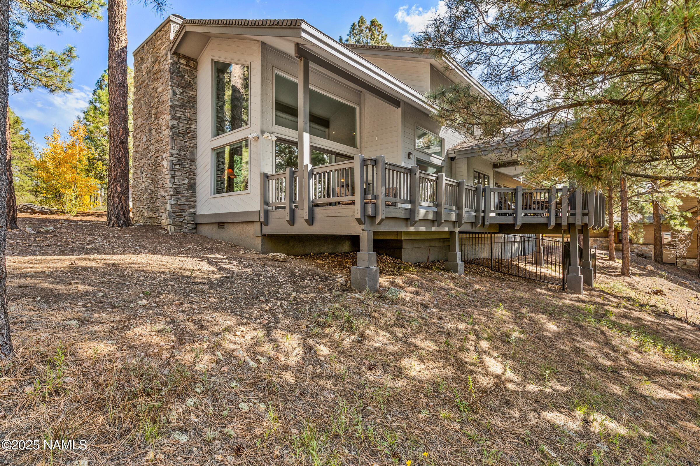 2252 Link Smith Flagstaff, AZ 86005 - Photo 45 of 53 a front view of a house with a yard