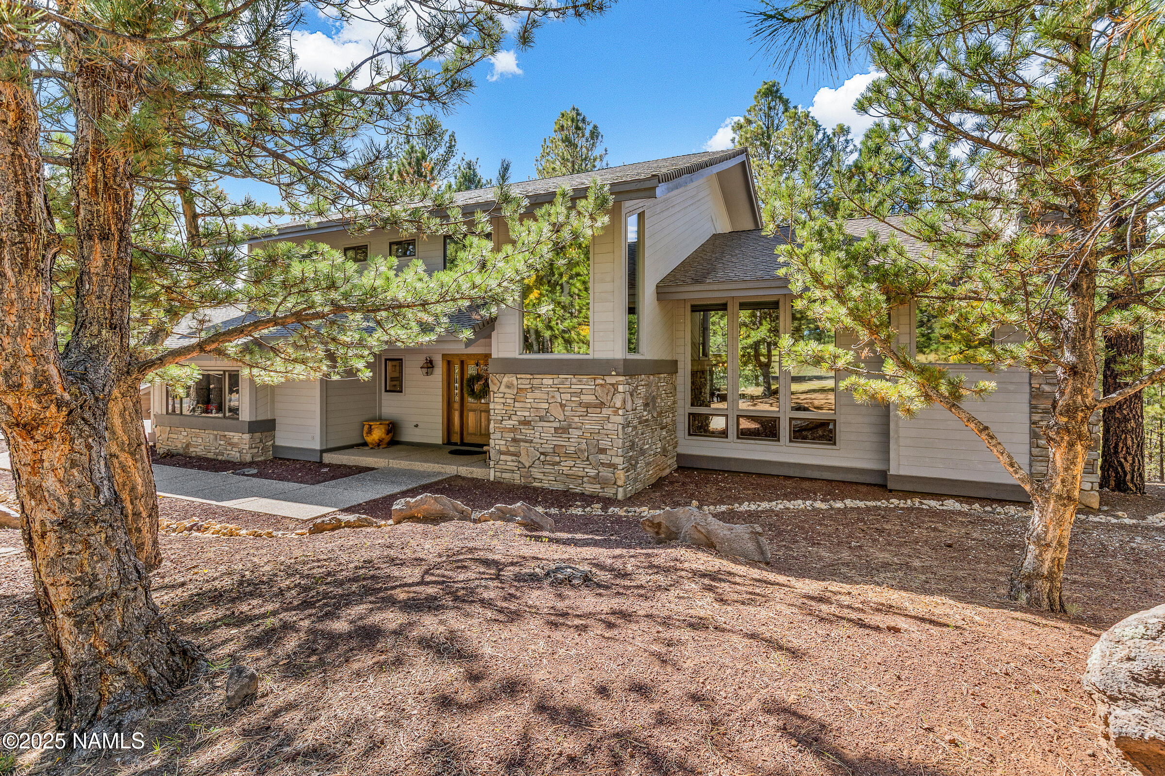 2252 Link Smith Flagstaff, AZ 86005 - Photo 5 of 53 a view of a house with a yard