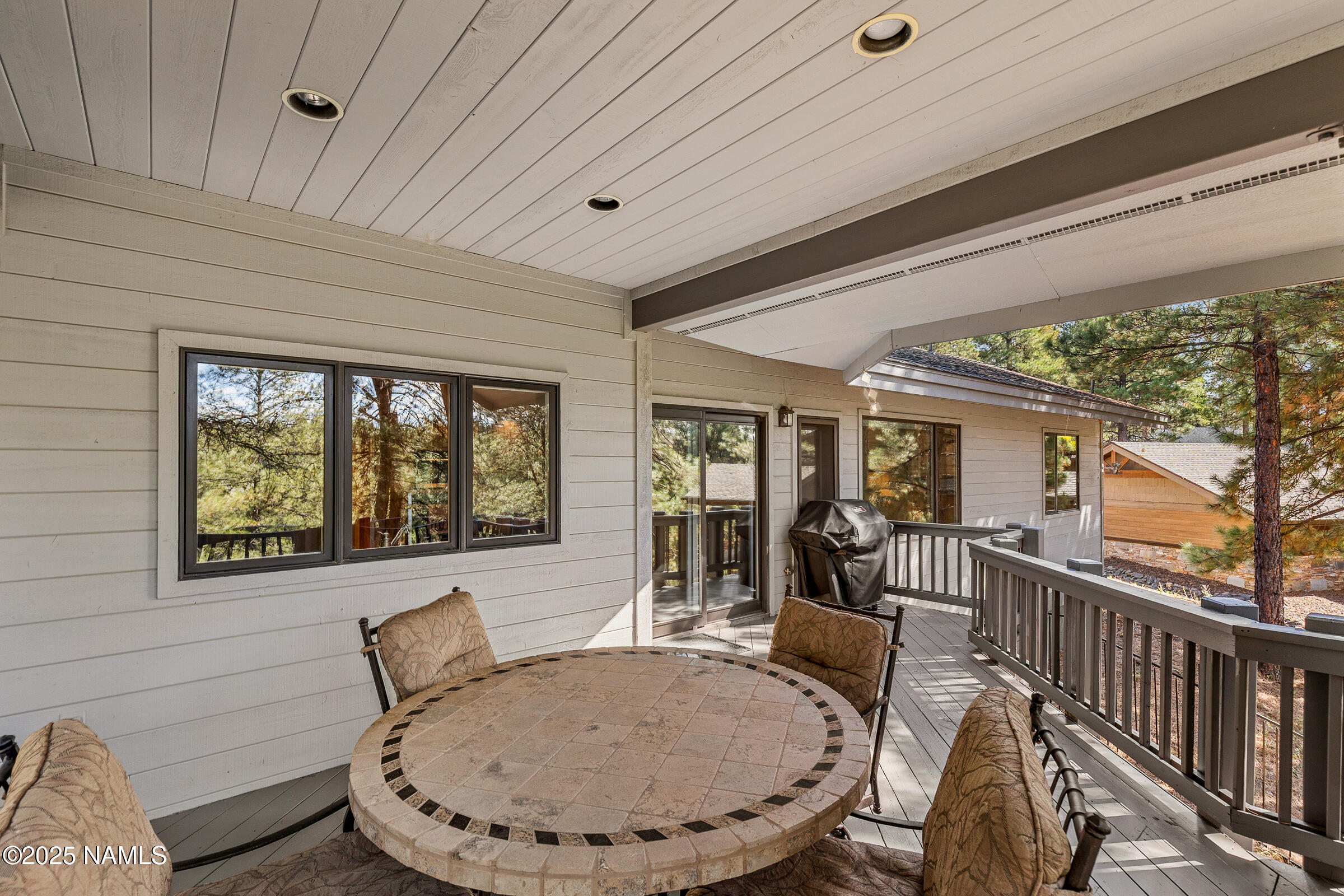2252 Link Smith Flagstaff, AZ 86005 - Photo 51 of 53 a view of a dining room with furniture window and wooden floor