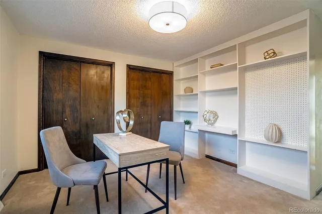 a bedroom with bed and a window