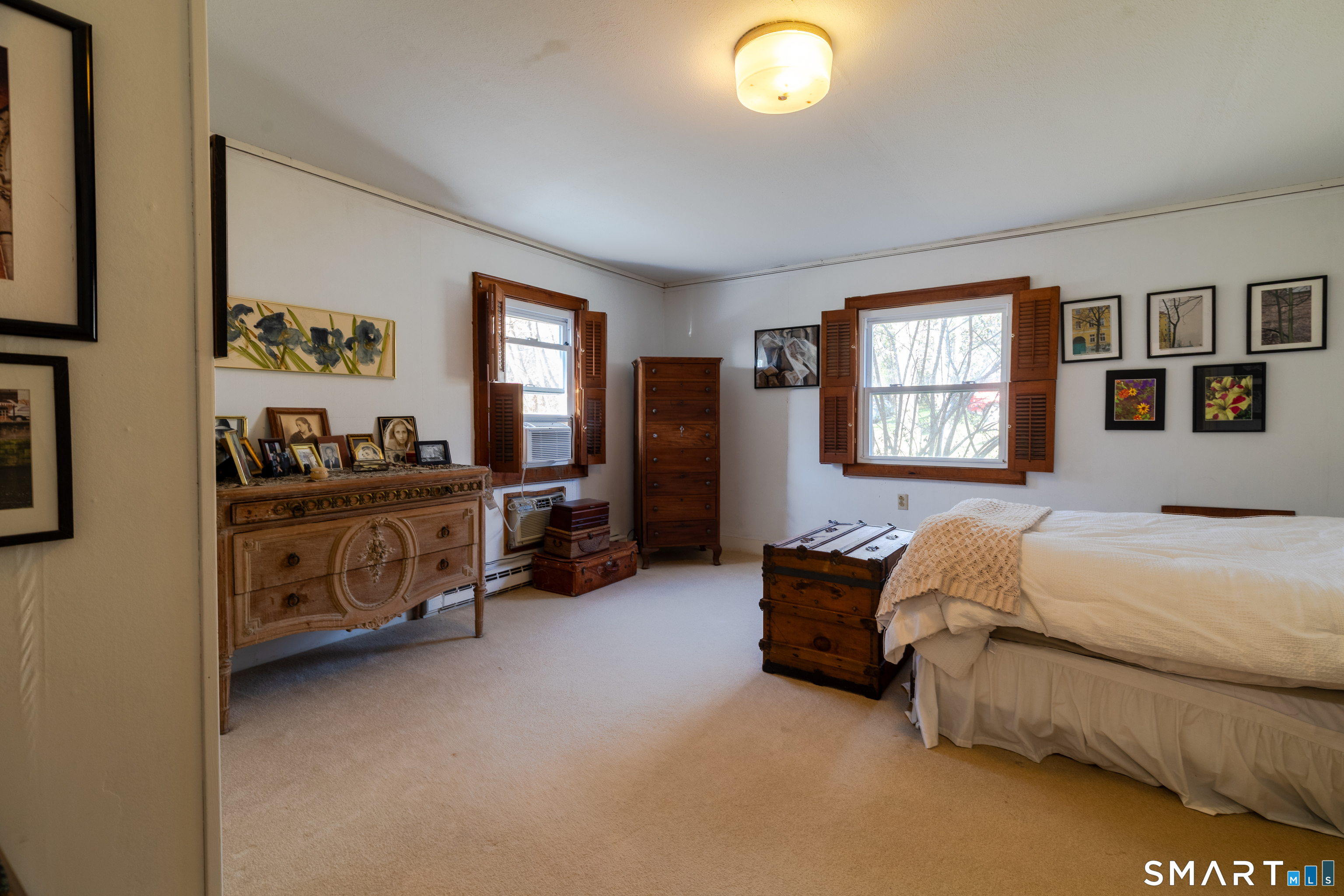 226 Pequot Avenue Groton, CT 06355 - Photo 9 of 11 a bed room with furniture and a window
