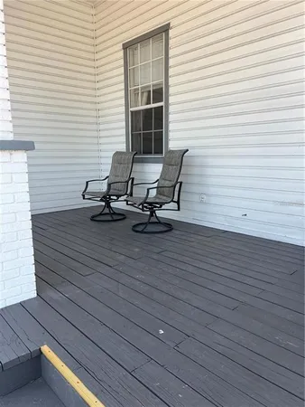 a view of a two chairs with wooden floor