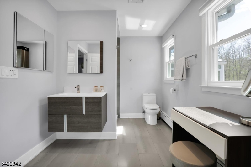 36 Coppergate Drive Bernards, NJ 07920 - Photo 15 of 50 a bathroom with a sink and a toilet