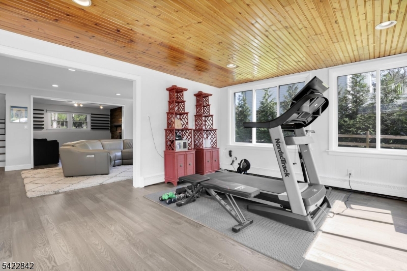 36 Coppergate Drive Bernards, NJ 07920 - Photo 24 of 50 a room with gym equipment and large window