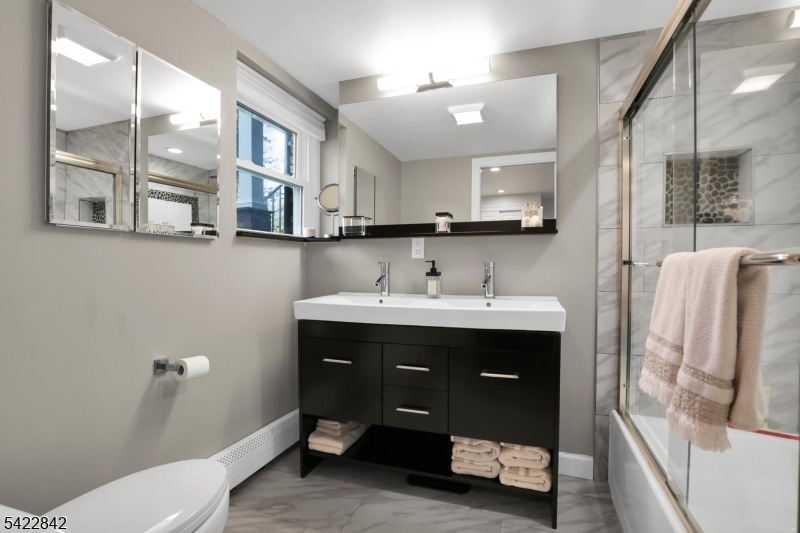 36 Coppergate Drive Bernards, NJ 07920 - Photo 28 of 50 a bathroom with a sink and a mirror