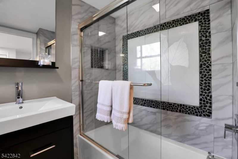 36 Coppergate Drive Bernards, NJ 07920 - Photo 29 of 50 a bathroom with a sink and a mirror