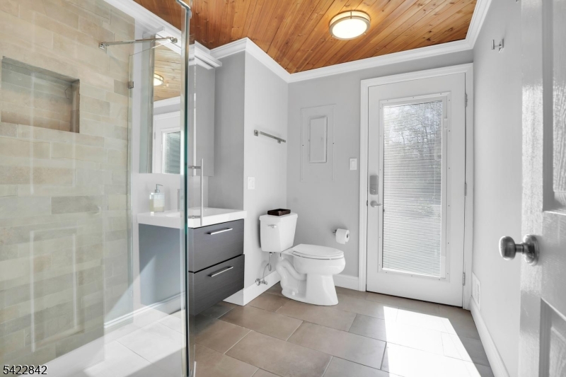 36 Coppergate Drive Bernards, NJ 07920 - Photo 37 of 50 a bathroom with a toilet sink and shower