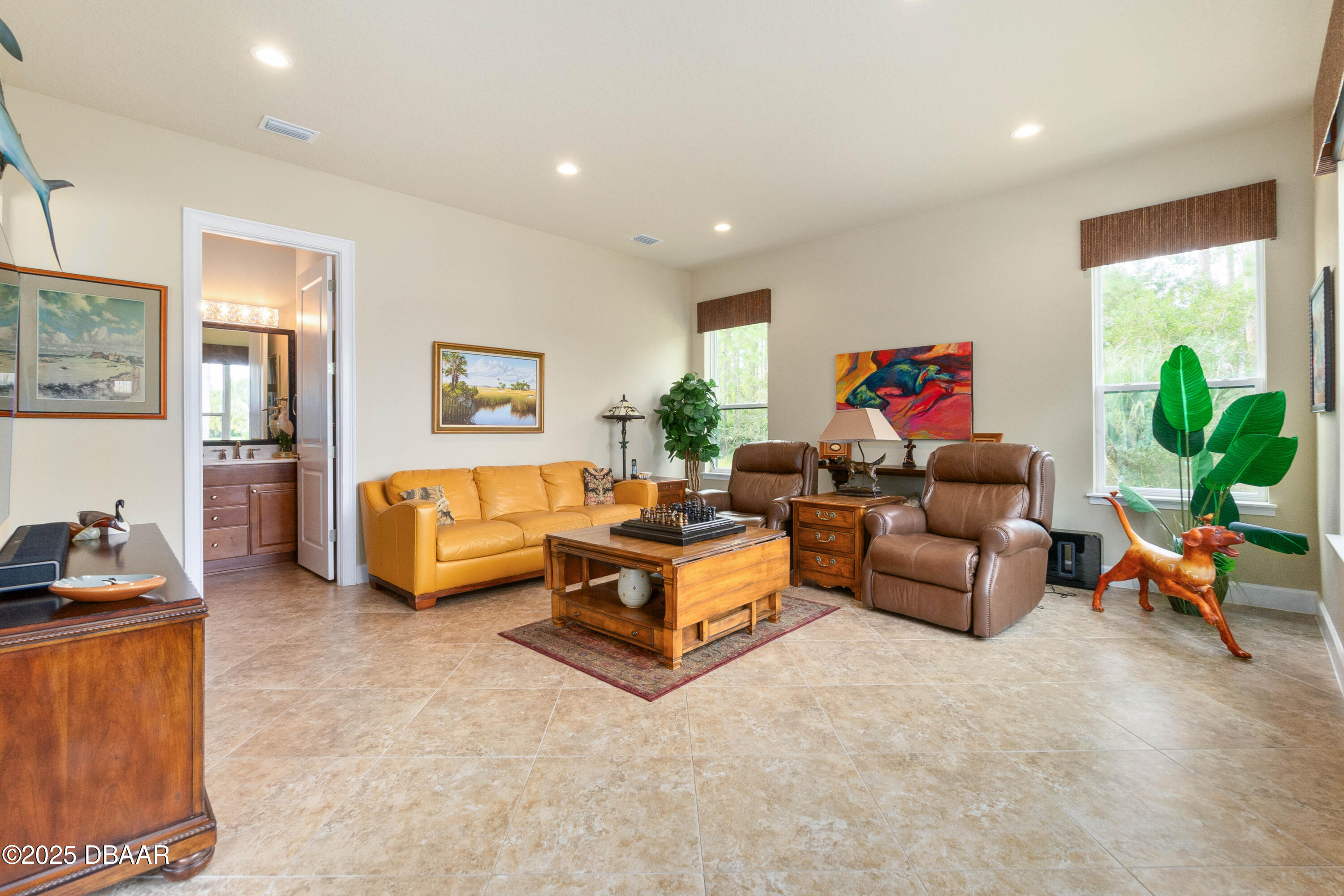 990 Downshire Lane Ormond Beach, FL 32174 - Photo 31 of 64 a living room with furniture and a couch