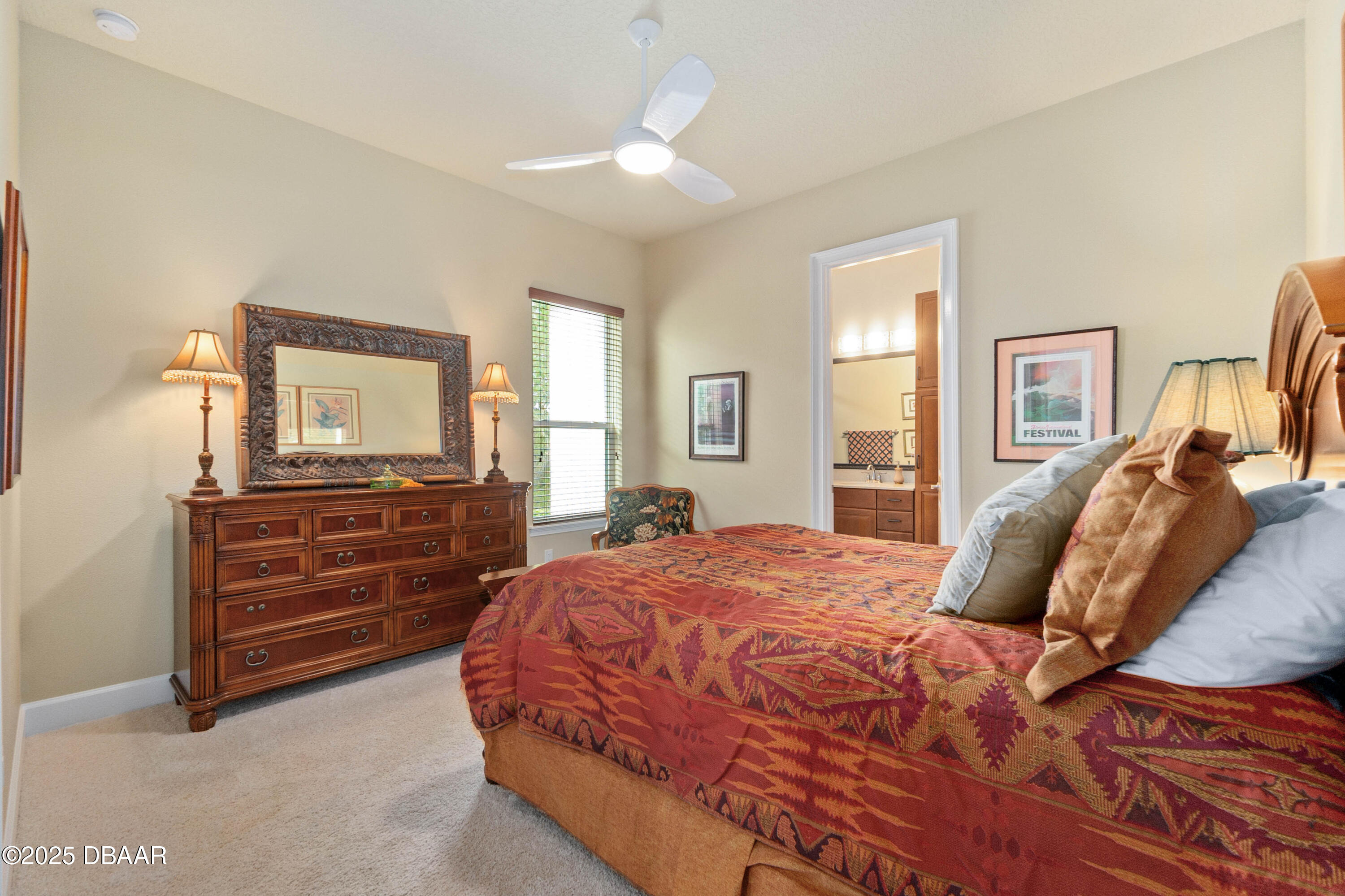 990 Downshire Lane Ormond Beach, FL 32174 - Photo 37 of 64 a bed room with a bed and a dresser