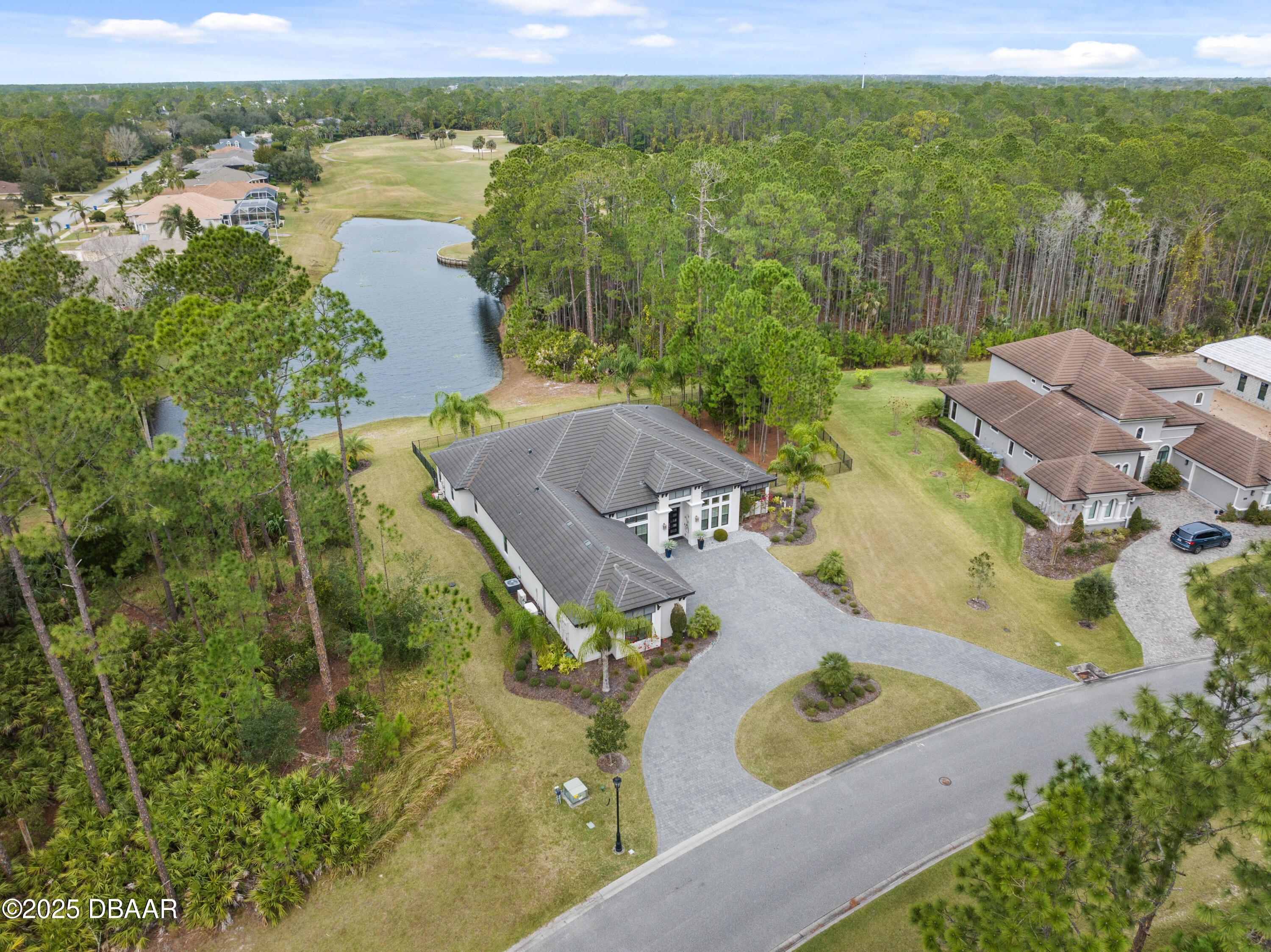 990 Downshire Lane Ormond Beach, FL 32174 - Photo 53 of 64 a view of a lake with outdoor space