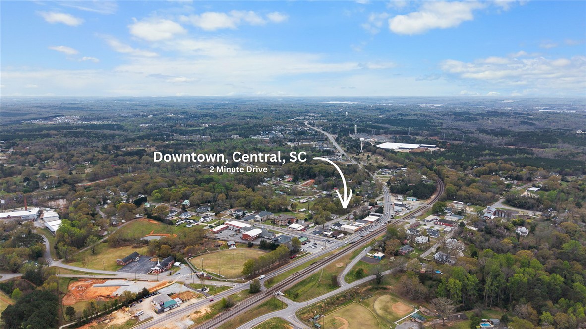 114 Sunny Pt Loop Central, SC 29630 - Photo 24 of 25 An aerial panorama reveals a dynamic community surrounded by lush, expansive landscapes.