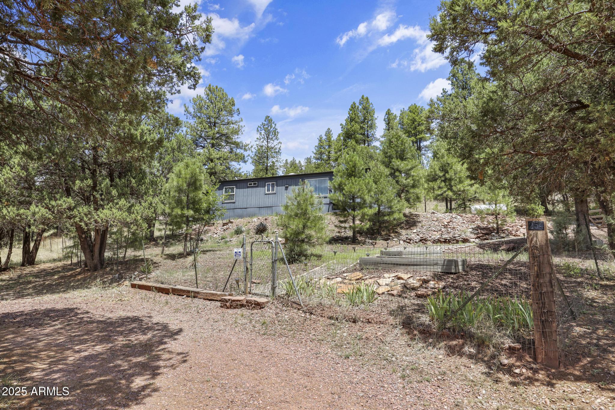 254 Blackfoot Road Payson, AZ 85541 - Photo 19 of 31 a view of backyard space and tree