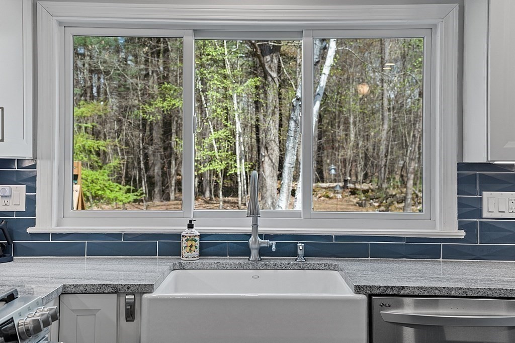 13 Olde Farms Road Boxford, MA 01921 - Photo 19 of 42 a kitchen sink sitting next to a window