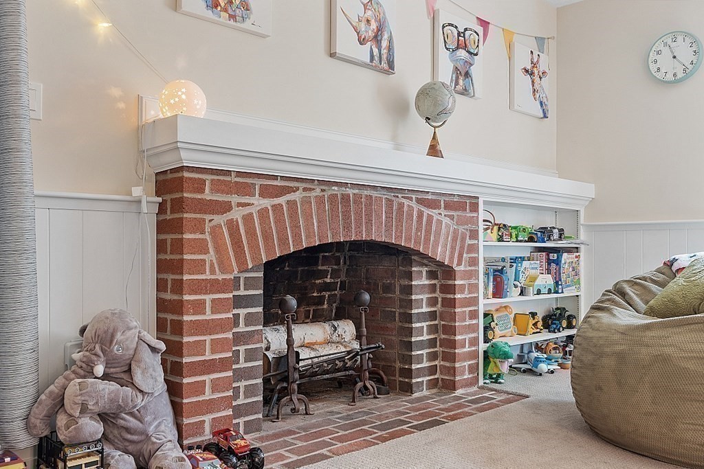 13 Olde Farms Road Boxford, MA 01921 - Photo 21 of 42 a living room with furniture and a fireplace