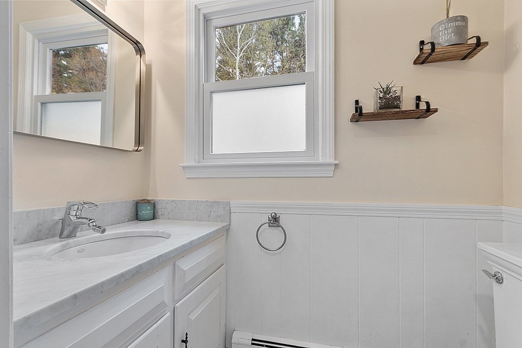 13 Olde Farms Road Boxford, MA 01921 - Photo 23 of 42 a bathroom with a sink and a mirror