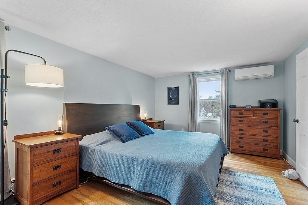 13 Olde Farms Road Boxford, MA 01921 - Photo 29 of 42 a bedroom with a bed and a dresser
