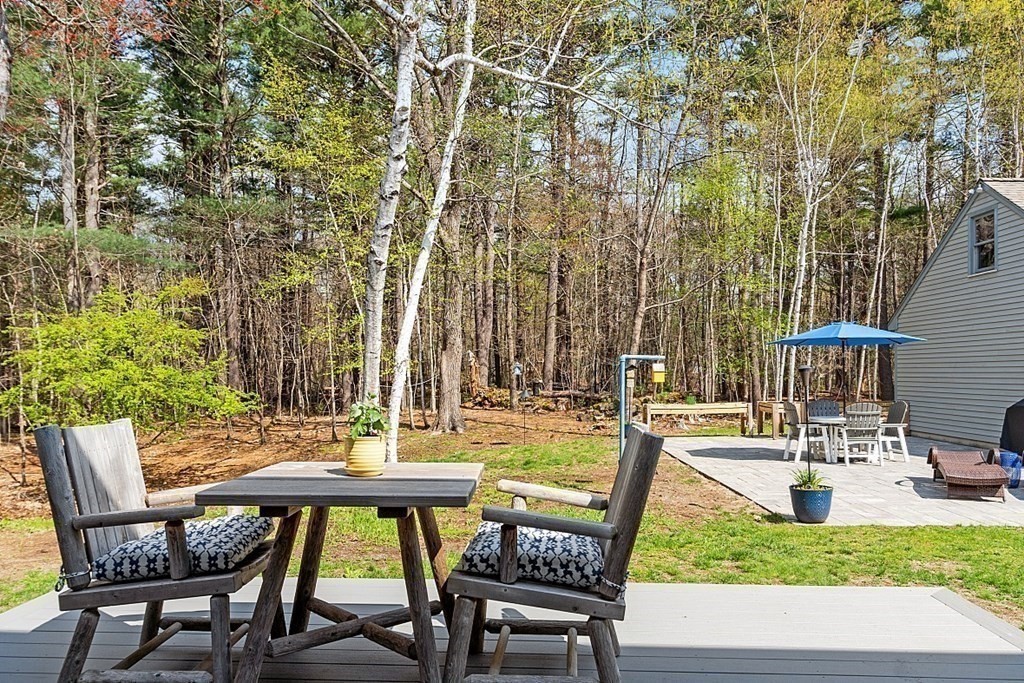 13 Olde Farms Road Boxford, MA 01921 - Photo 5 of 42 a view of an outdoor sitting area with chairs