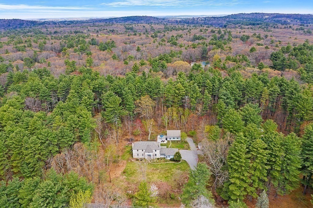 13 Olde Farms Road Boxford, MA 01921 - Photo 8 of 42 a view of a lake with mountains in the background