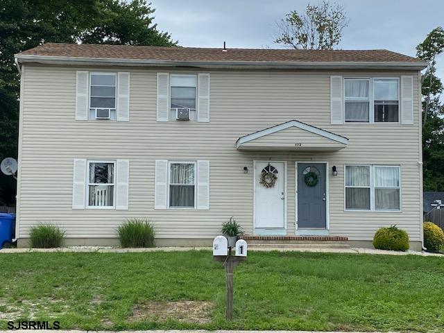 772 Jane Drive Manahawkin, NJ 08050 - Photo 1 of 18 a front view of a house with a yard