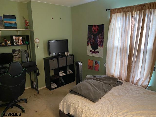 772 Jane Drive Manahawkin, NJ 08050 - Photo 12 of 18 a bedroom with a bed and a window