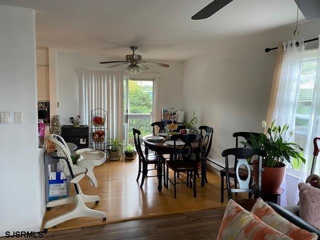 772 Jane Drive Manahawkin, NJ 08050 - Photo 13 of 18 a view of a workspace with furniture and a potted plant